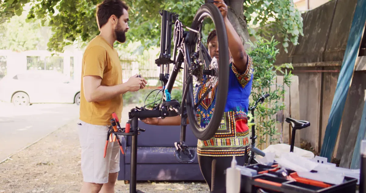 interracial-couple-inspecting-bicycle